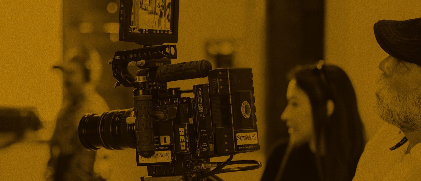 Film professionals using a camera