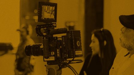 Film professionals using a camera